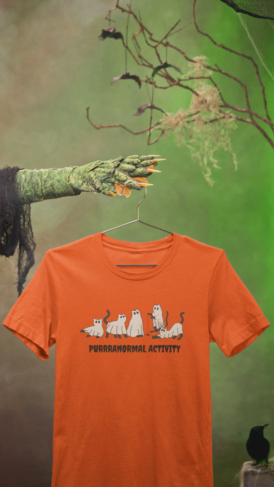 Load and play video in Gallery viewer, PURRRANORMAL ACTIVITY Unisex Tee - All The Fauna - Support Animal Shelter Fundraising - Gifts for Animal Lovers
